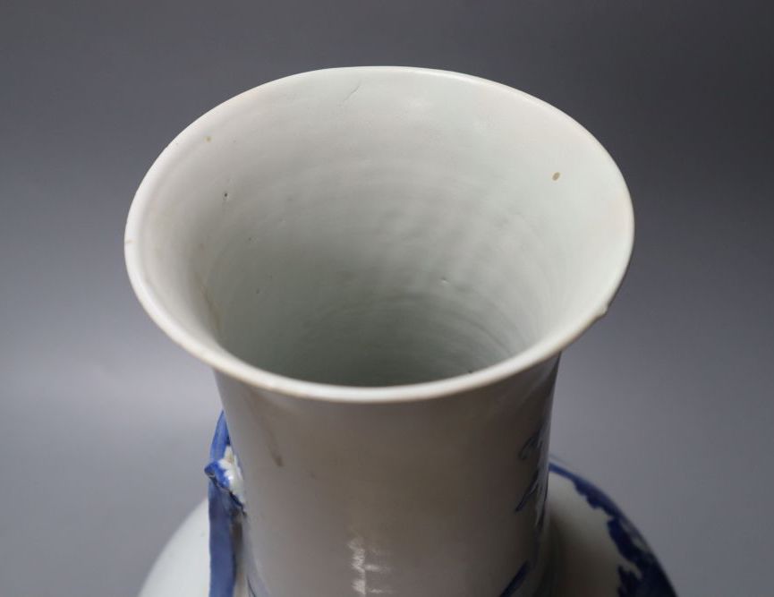 A 19th century Chinese porcelain blue and white vase and stand, neck sprigged with a serpent, on wood plinth, 49cm total height